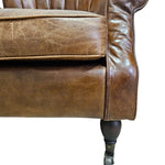 THE One Vintage-Style Fluted Brown Leather Armchair on Castors