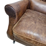 THE One Vintage-Style Fluted Brown Leather Armchair on Castors