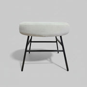 Minimalist Off White Fabric Round Footstool with Tapered Black Metal Legs
