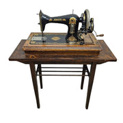 Antique Jones Hand-Crank Sewing Machine with Wooden Table