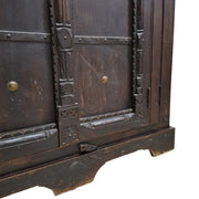 Ornate Dark Wood Cabinet with Metal Accents