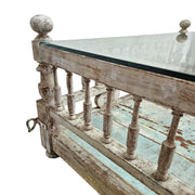 Charaka Style Distressed Wood and Glass Top Coffee Table