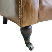 THE One Vintage-Style Fluted Brown Leather Armchair on Castors