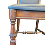 Stately Studded Black Leather and Carved Wood Accent Dining Chair