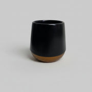 Contemporary Matte Black Ceramic Vessel with Wood-Finished Base