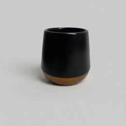 Contemporary Matte Black Ceramic Vessel with Wood-Finished Base