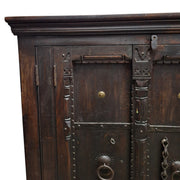 Ornate Dark Wood Cabinet with Metal Accents