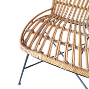 Boho-Chic Rattan Accent Chair with Slender Metal Legs