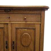 Antique-Inspired Oak Storage Cabinet with Reeded Accents