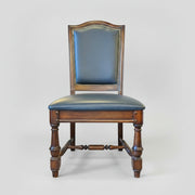 Stately Studded Black Leather and Carved Wood Accent Dining Chair