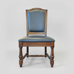 Stately Studded Black Leather and Carved Wood Accent Dining Chair